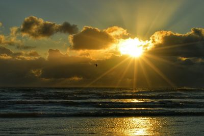 Scenic view of sunset over sea