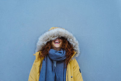 Portrait of young woman in snow