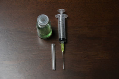 High angle view of bottles on table