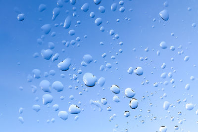 Full frame shot of wet glass