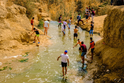 People standing in water