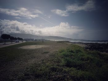 Scenic view of beach against sky