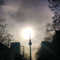 Low angle view of building against cloudy sky