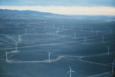 Windmills at atacama desert during sunset