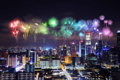 Firework display at night