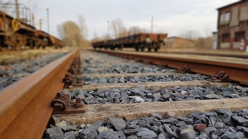 Close-up of railroad track against sky