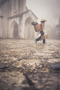 Man walking in historic building