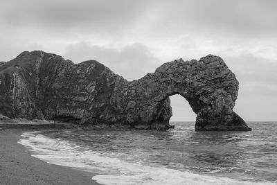 The arch of durdle dor on a stormy day