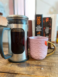 Close-up of coffee cup on table