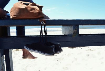 Shoes hanging at beach