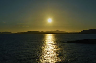 Scenic view of mountains at sunset