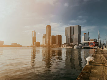 Panoramic view of city buildings against sky