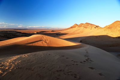 Scenic view of desert against sky