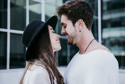 Portrait of young couple outdoors