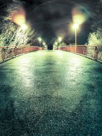 Illuminated street lights at night