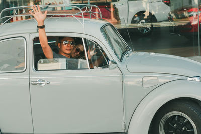 Portrait of man in car