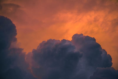 Low angle view of cloudy sky at sunset