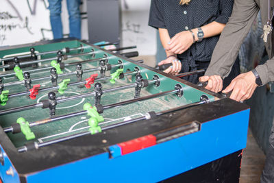 Young people playing table football