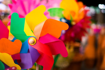 Close-up of multi colored toy on paper