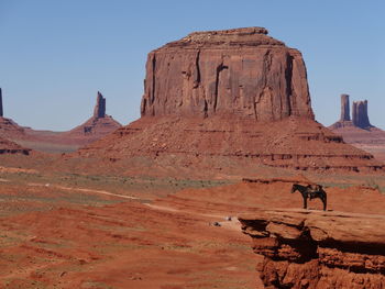 Horse on rock formations
