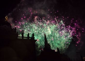 Firework display at night