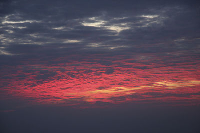 Low angle view of dramatic sky during sunset