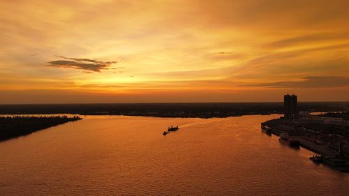 Scenic view of sea against sky during sunset