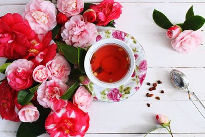 High angle view of pink roses on table