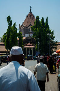 Rear view of man against clear sky
