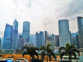 Modern buildings in city against sky