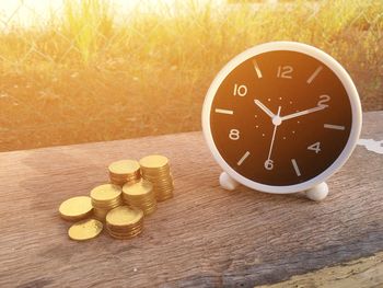 Close-up of clock on table