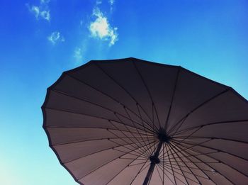 Low angle view of building against blue sky