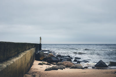 Scenic view of sea against sky. pier