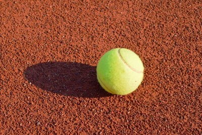 High angle view of yellow ball on field