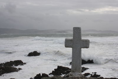 Scenic view of sea against sky during winter