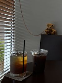 Glass of tea cup on table