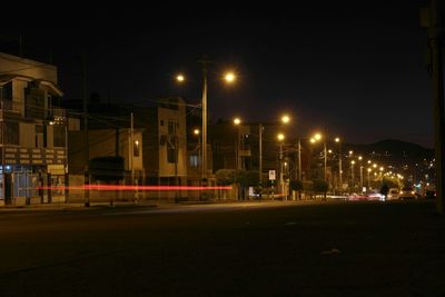 Illuminated street light at night