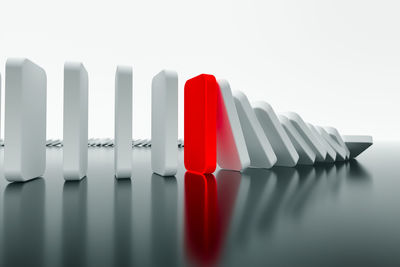 Close-up of toy on table against white background