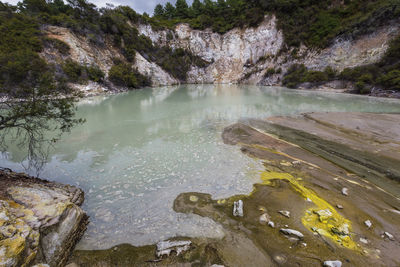 Scenic view of river amidst rocks