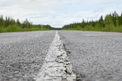 Surface level of road against sky