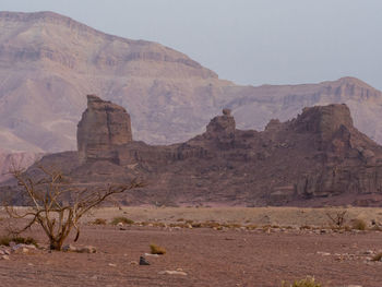 Scenic view of rocky mountains against sky