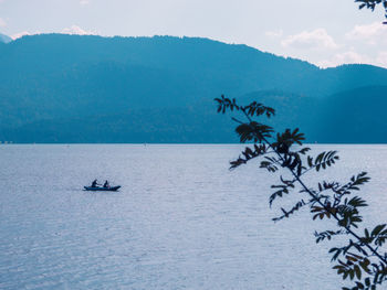 Scenic view of sea against blue sky