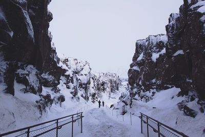 Scenic view of snow covered landscape against clear sky