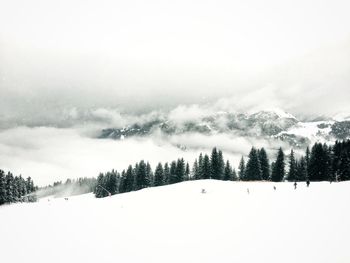 Scenic view of snow covered mountains