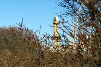 Low angle view of building against blue sky