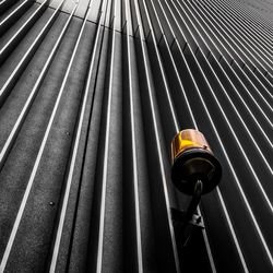 High angle view of siren mounted on building