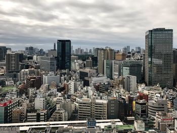 High angle shot of cityscape against sky