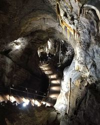 Low angle view of illuminated cave