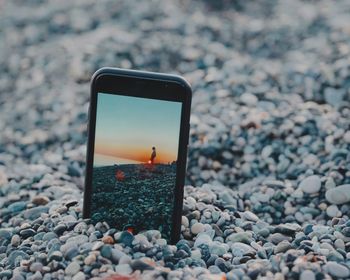 Close-up of camera on rock