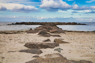 Scenic view of beach against sky